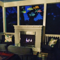 screen porch with fireplace
