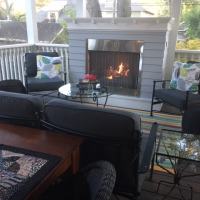 screen porch with fireplace