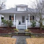 Front of white bungalow